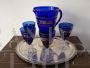 Set of glasses and carafe in blue Murano glass with gold decorations, mid-19th century