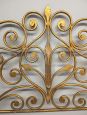 Antique wrought iron bed headboard painted with gold highlights, 19th century                            