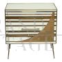 Three-drawer dresser with white and gold glass geometries                            