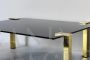 Design coffee table in brass and black glass, 1970s