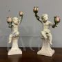 Pair of ceramic candlesticks with cherubs by Angelo Minghetti, Italy late 19th century