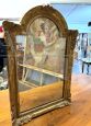 Small antique Louis Philippe mirror carved and gilded, 19th century