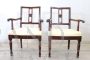 Pair of antique Louis XVI walnut armchairs from the 18th century