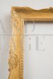 Antique Neapolitan Empire frame in gilded wood, carved and shaped