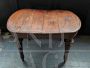 Antique extendable table with oval top  