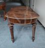 Antique extendable table with oval top