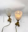 Pair of art deco bedside lamps in bronze and glass