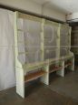 Vintage 1950s shop counter and shelving unit in green paint