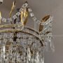 Early 1900s 8-light chandelier in gold metal with crystal drops