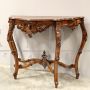 Antique Louis Philippe console table in richly carved walnut