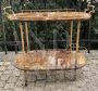 Serving trolley by Aldo Tura in brass and glazed parchment