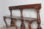 Antique 18th century bench in walnut with turned columns