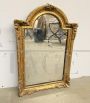 Small antique Louis Philippe mirror carved and gilded, 19th century