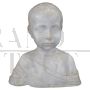 Marble bust sculpture of a child from the early 1900s