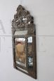 Small antique 19th century mirror in wood and embossed brass