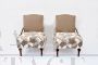 Pair of vintage design armchairs with double-sided backrests      