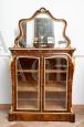 Antique Victorian display cabinet in walnut briar with bronzes and mirror on the top