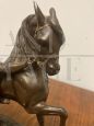 Antique antimony sculpture of a horse with a character, late 19th century