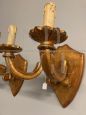 Pair of antique gilded candle-shaped wall lights from 19th century