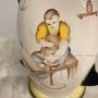 Futuristic 1930s majolica vase with ceramist figure