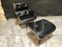 Eames lounge chair in black leather with certificate of authenticity