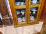 Vintage display cabinet glass cupboard in oak, with beveled glasses