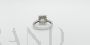 Women's ring in diamond-cut white gold