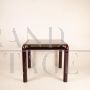 Orsay 54A table by Gae Aulenti for Knoll with glass top, burgundy color