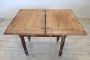 Antique extendable poplar kitchen table from the 19th century