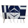 Sideboard with white and blue glass geometries