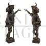 Pair of antique candlesticks with Venetian Moors in bronze, 20th century