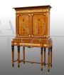 Antique sideboard or bookcase with rich inlays and bronze decorations