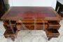 Antique Louis Philippe desk in mahogany feather with leather top