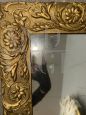 Antique gilded mirror with floral carvings, 19th century