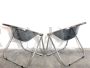 Pair of black Plona armchairs by Giancarlo Piretti for Anonima Castelli