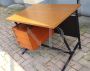 Vintage desk in teak wood and black tufted skai leather