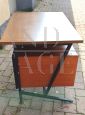 Vintage desk in teak wood and black tufted skai leather