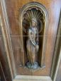 Living room set with buffet & hutch cupboard and a sideboard, all carved with statues