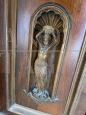 Living room set with buffet & hutch cupboard and a sideboard, all carved with statues