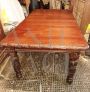 Antique Victorian hand crank extendable table with carvings