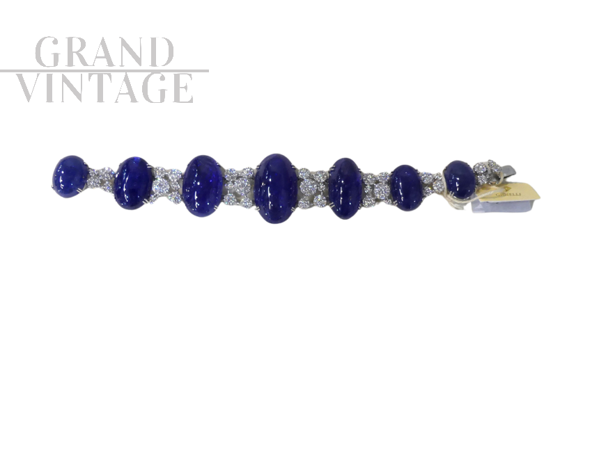 Bracciale in oro bianco con diamanti e Tanzanite cabochon                            