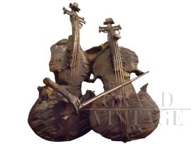 Scultura con coppia di violoncelli stile Délabrée