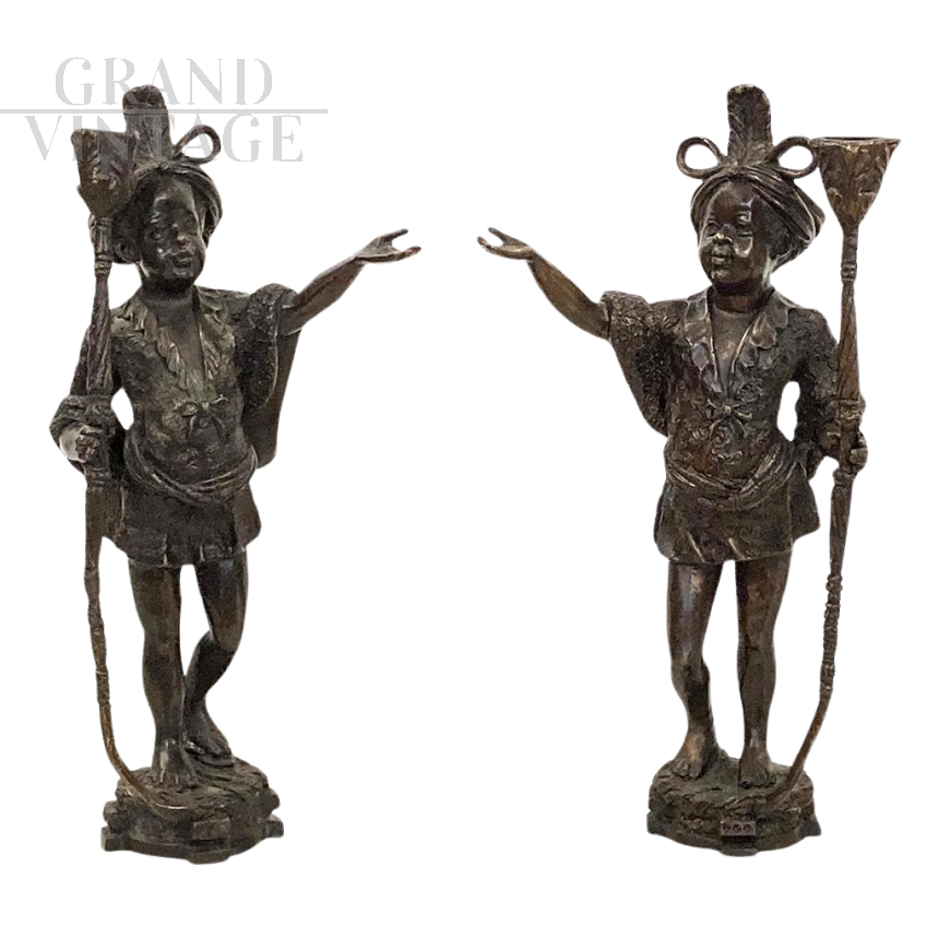 Pair of antique candlesticks with Venetian Moors in bronze, 20th century