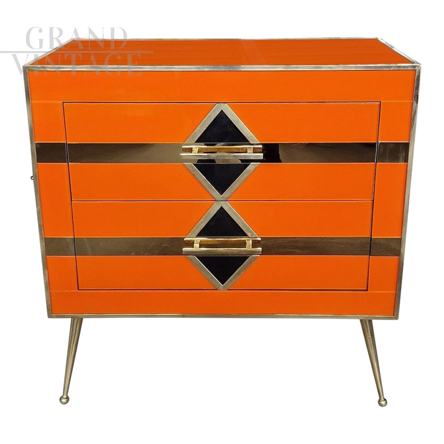 Art deco style bedside cabinet in orange glass with geometries