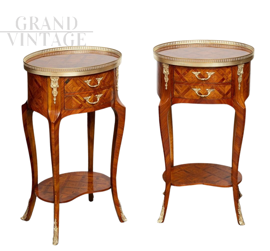 Pair of antique oval bedside tables with two drawers with inlays and bronzes