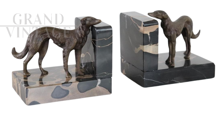 Pair of Art Deco bookends with greyhound dogs in bronze and Portoro marble        