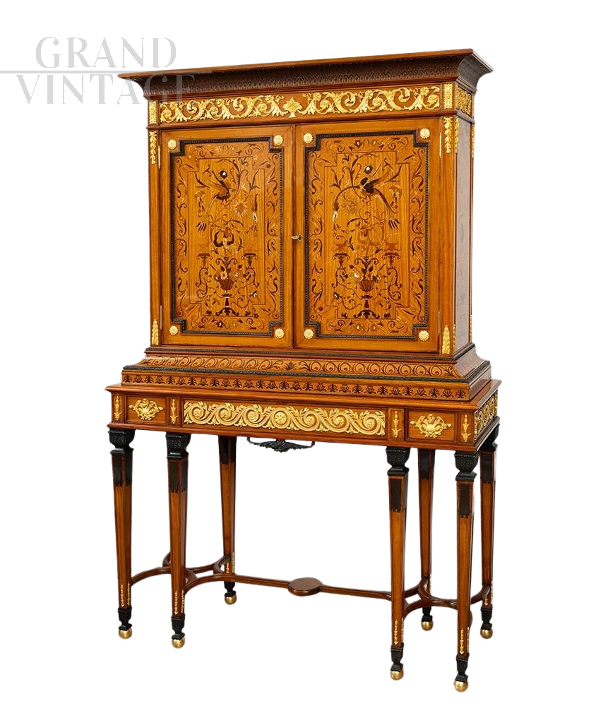 Antique sideboard or bookcase with rich inlays and bronze decorations