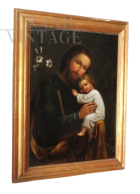 Antique painting depicting Saint Joseph with Child, oil on canvas from the 18th century