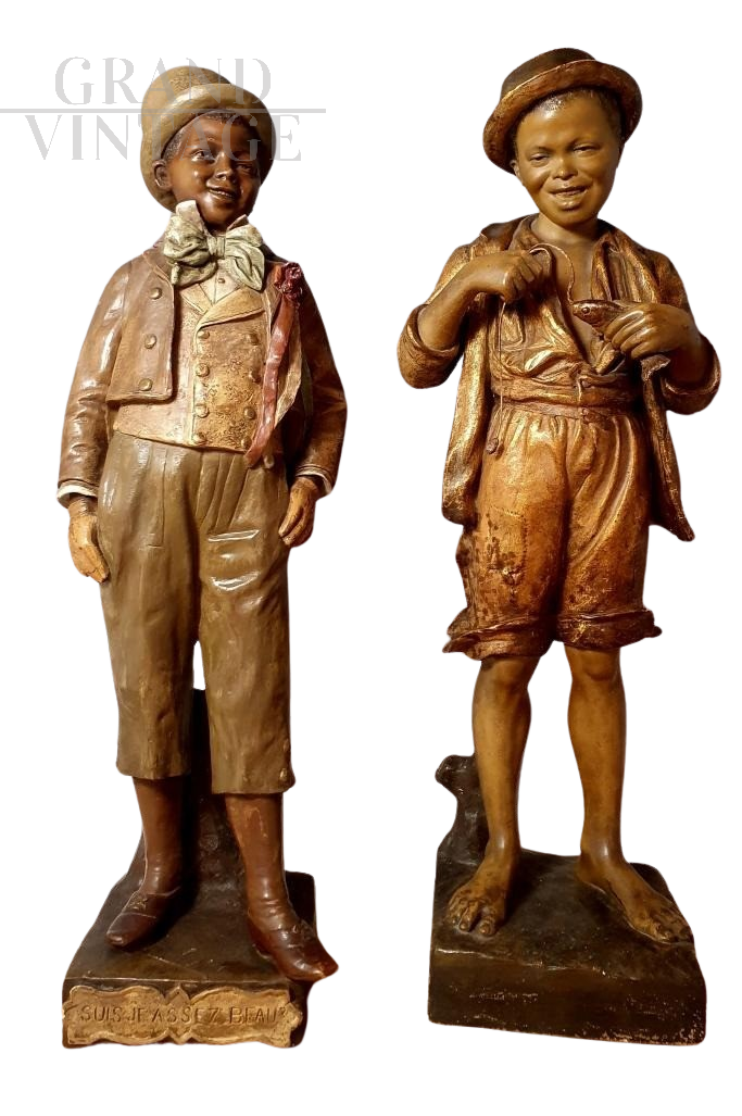 The rich kid and the poor kid - terracotta sculptures by Friederich Goldscheider