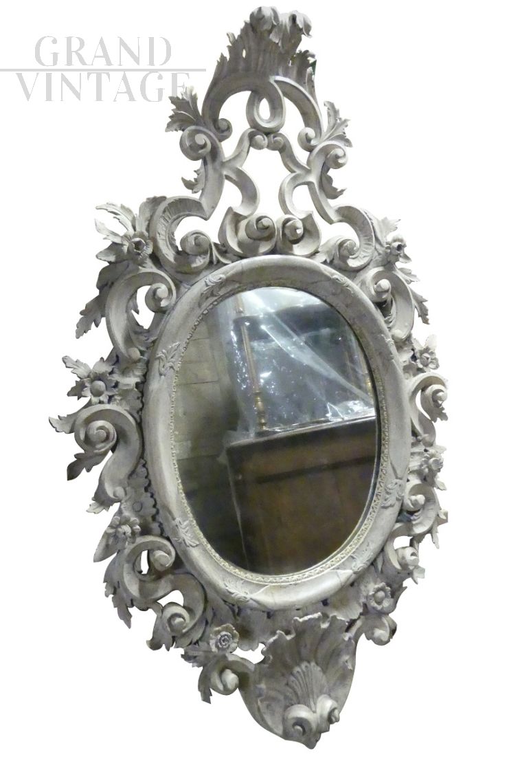 Mercury mirror from the 19th century with carved frame